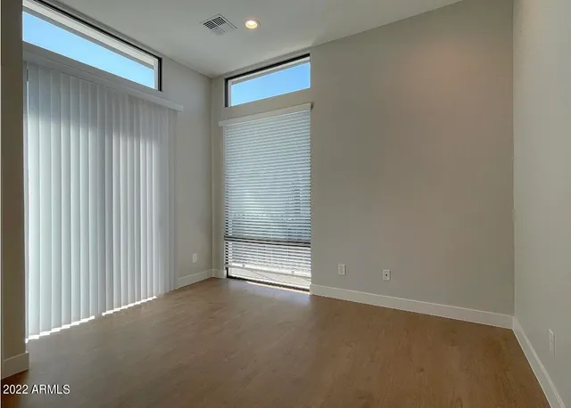 an empty room with windows