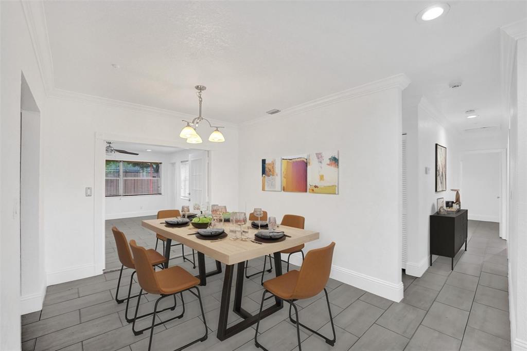 7021 Park Street Hollywood, FL 33024 - Photo 4 of 9 a dining room with furniture and window