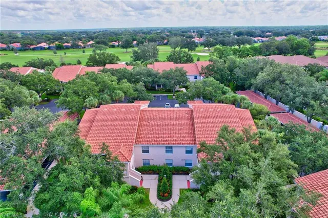 an aerial view of a house with big garden