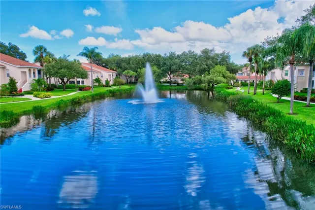 a view of a garden with houses