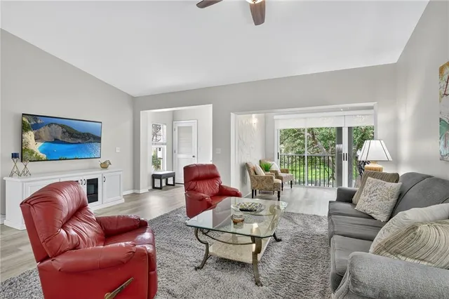 a living room with furniture or couch and a window