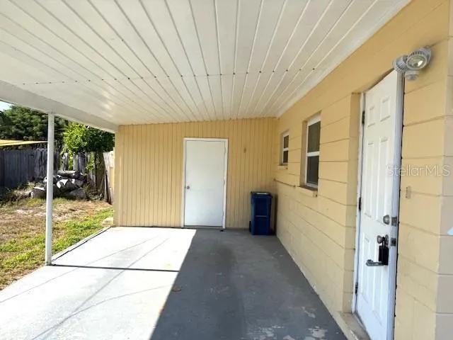a kitchen with stainless steel appliances granite countertop a stove sink and microwave