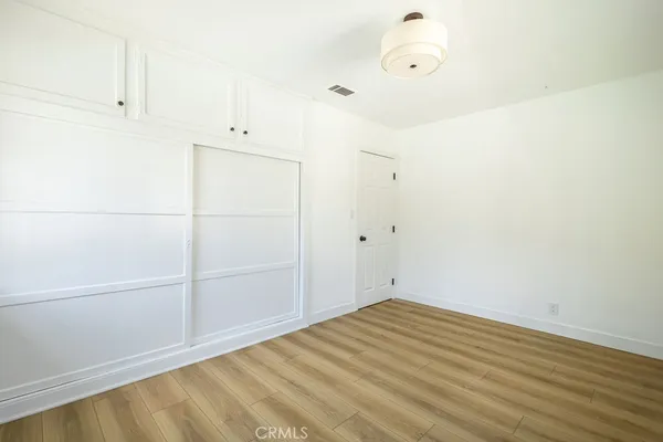 a view of a room with an empty space