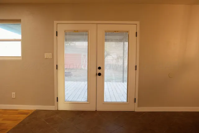 an empty room with windows