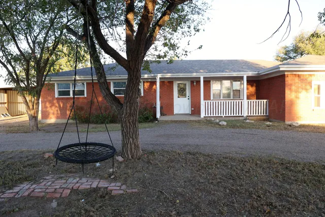 a view of a house with a patio
