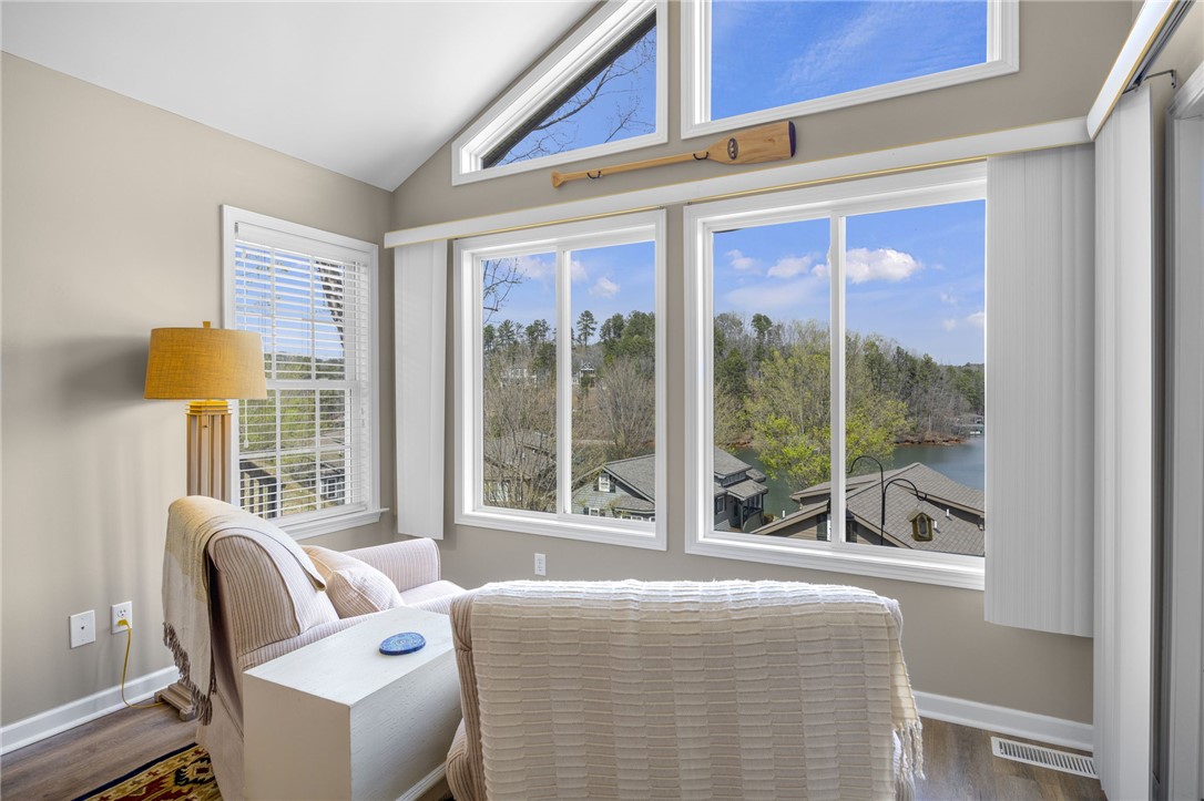 1230 Melton Road, Unit 93 West Union, SC 29696 - Photo 14 of 45 This bright space features ample windows offering tranquil views of the surrounding lake and nature.