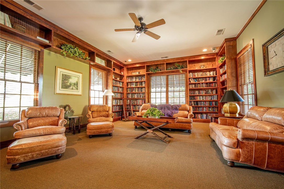 1230 Melton Road, Unit 93 West Union, SC 29696 - Photo 40 of 45 This inviting library features abundant built-in shelving, creating a perfect space for relaxation and reading.