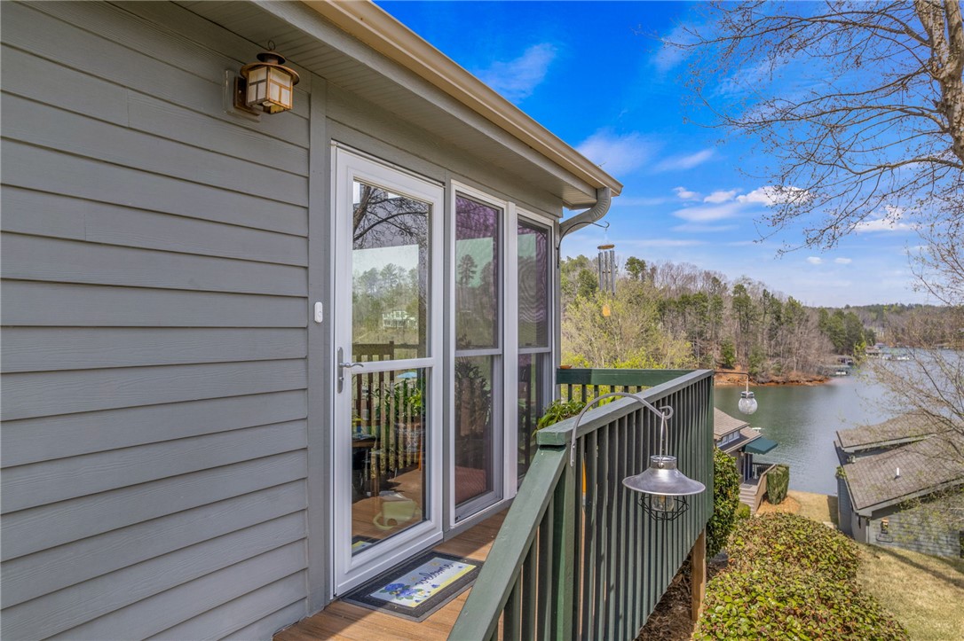 1230 Melton Road, Unit 93 West Union, SC 29696 - Photo 4 of 46 This tranquil porch offers serene outdoor living with captivating lake views.