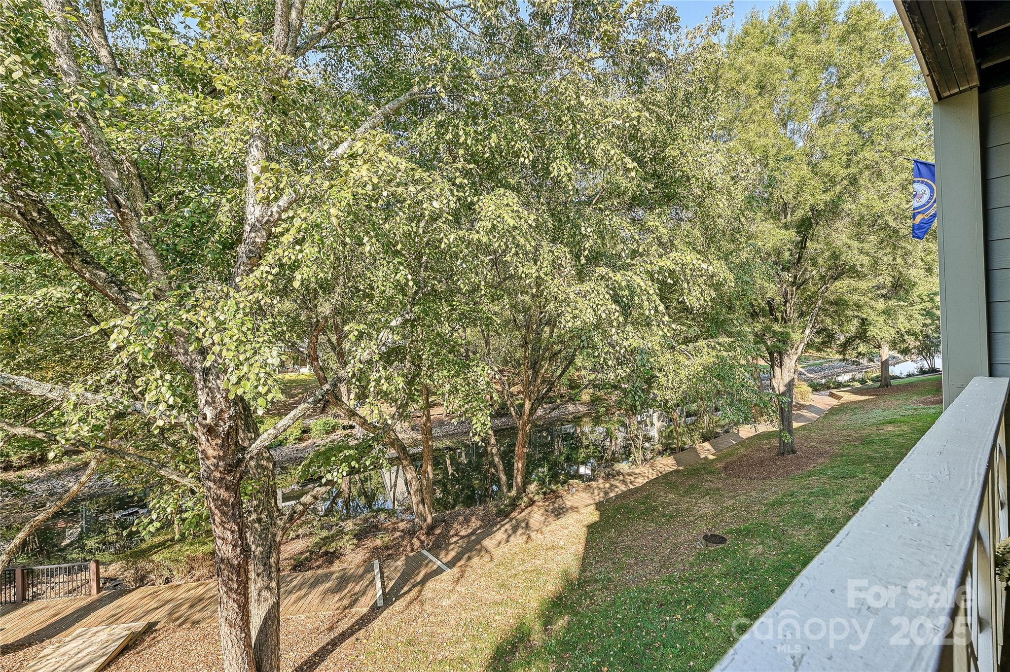 19901 Henderson Road, Unit C Cornelius, NC 28031 - Photo 16 of 42 a view of a yard with a trees