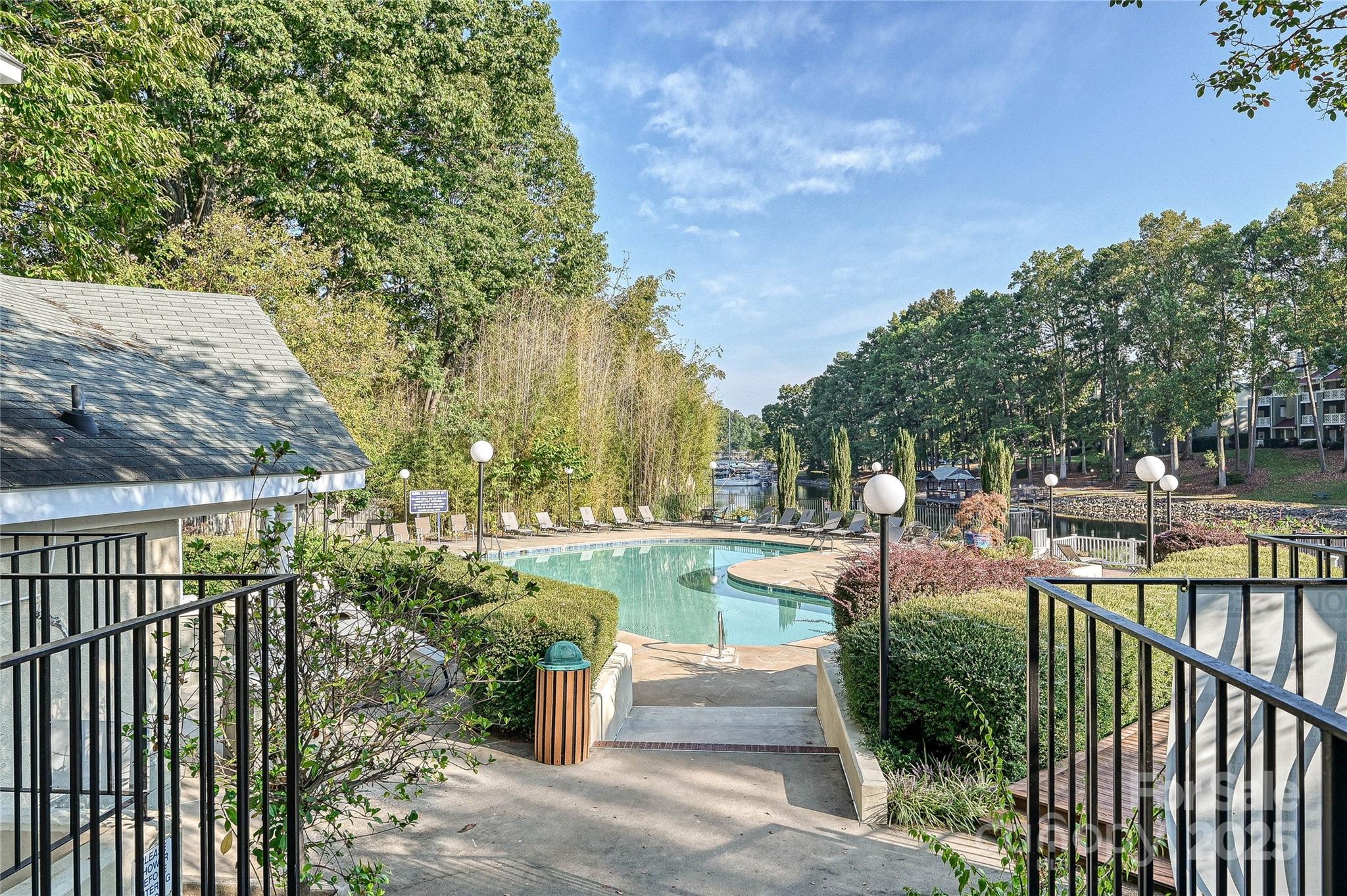 19901 Henderson Road, Unit C Cornelius, NC 28031 - Photo 28 of 42 a view of a backyard with sitting area
