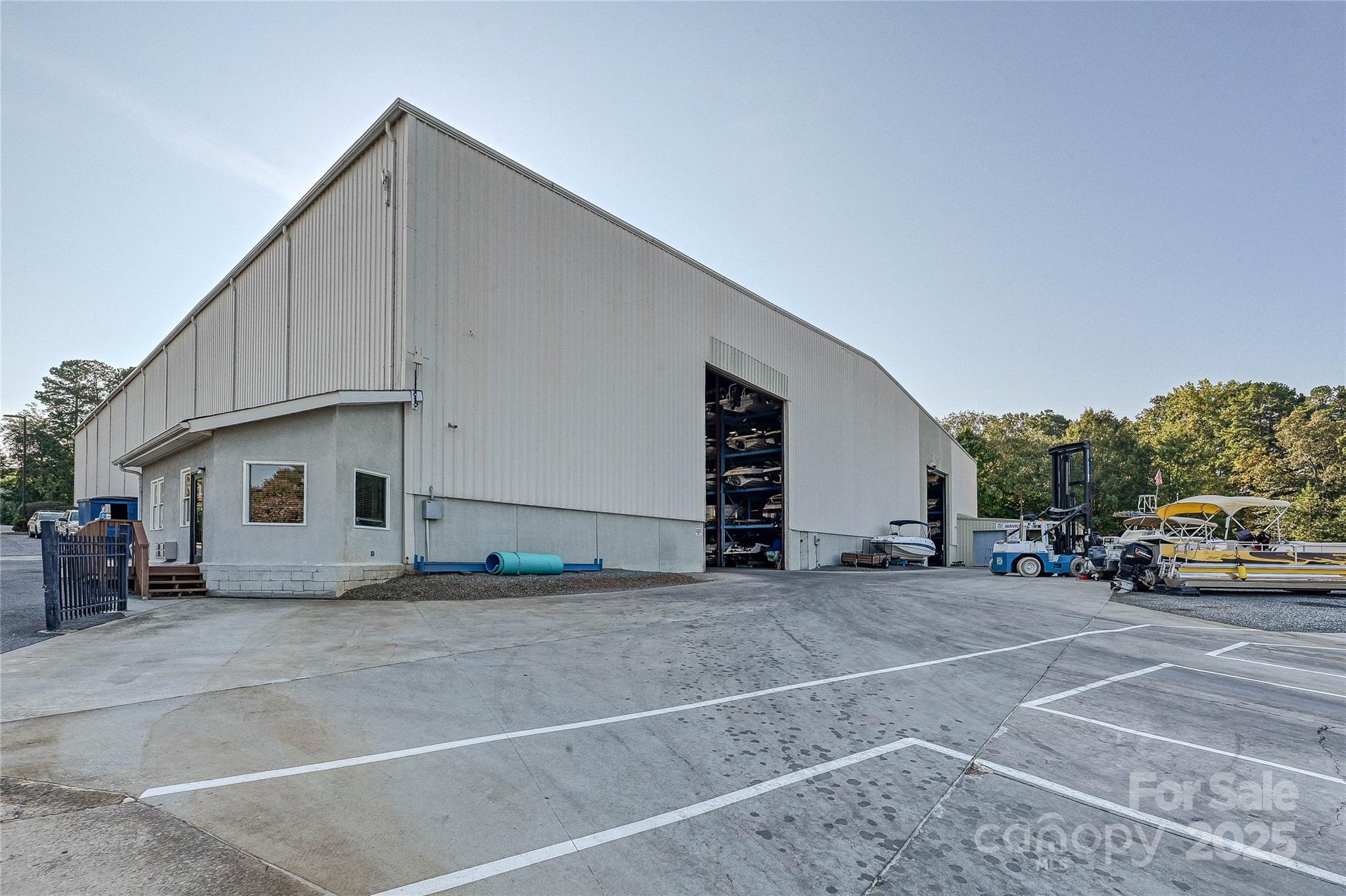 19901 Henderson Road, Unit C Cornelius, NC 28031 - Photo 35 of 42 a view of a cars park in front of house