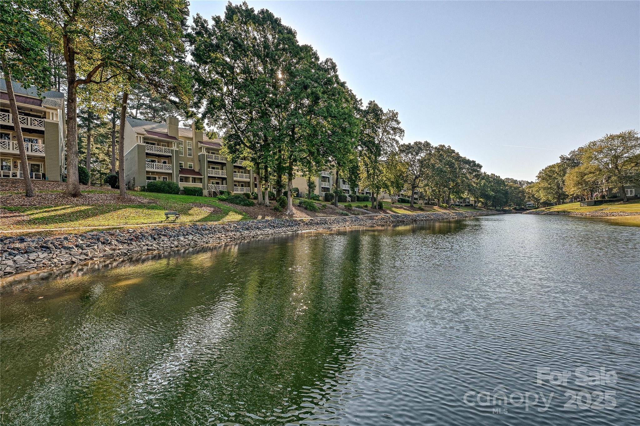 19901 Henderson Road, Unit C Cornelius, NC 28031 - Photo 40 of 42 a view of a lake with houses