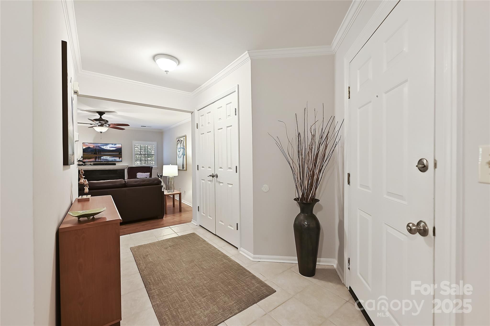 19901 Henderson Road, Unit C Cornelius, NC 28031 - Photo 5 of 42 a bedroom with a bed and wooden floor