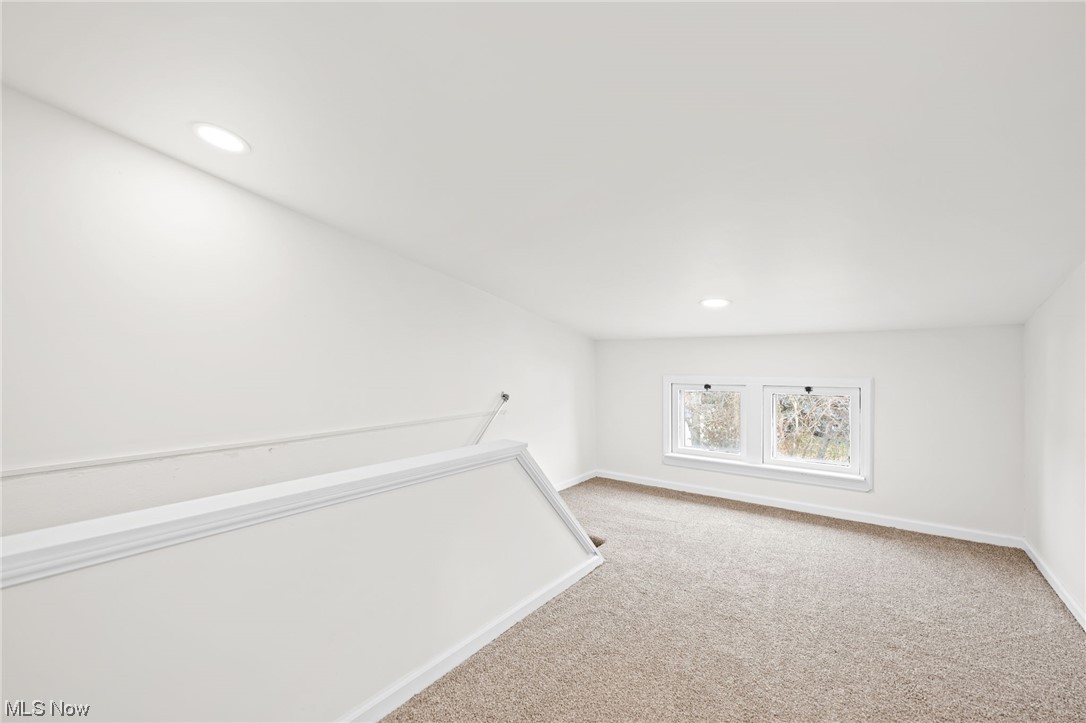 3561 Warren Road Cleveland, OH 44111 - Photo 17 of 28 Empty room with light carpet