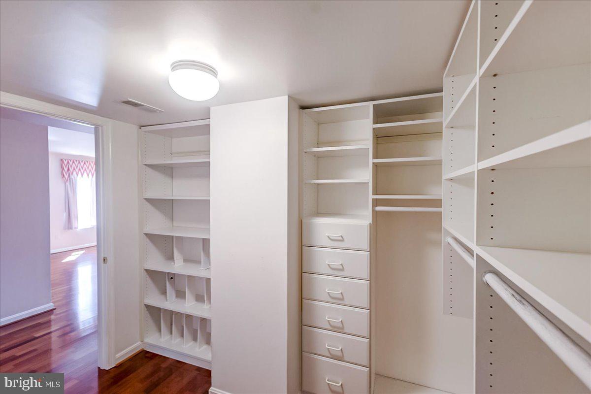 12330 Rosslare Ridge Road, Unit 406 Lutherville-Timonium, MD 21093 - Photo 26 of 37 Spacious, organized closet retreat.