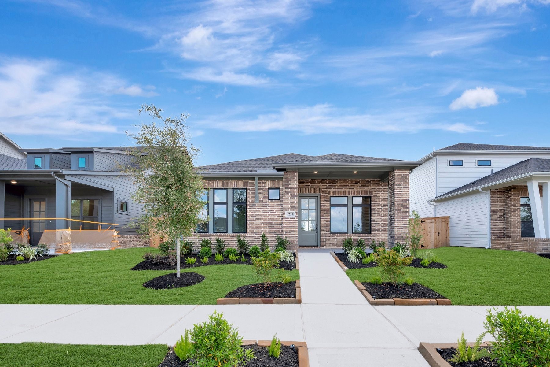 2722 Cottage Place Rosharon, TX 77583 - Photo 2 of 50 a front view of a house with a yard and potted plants