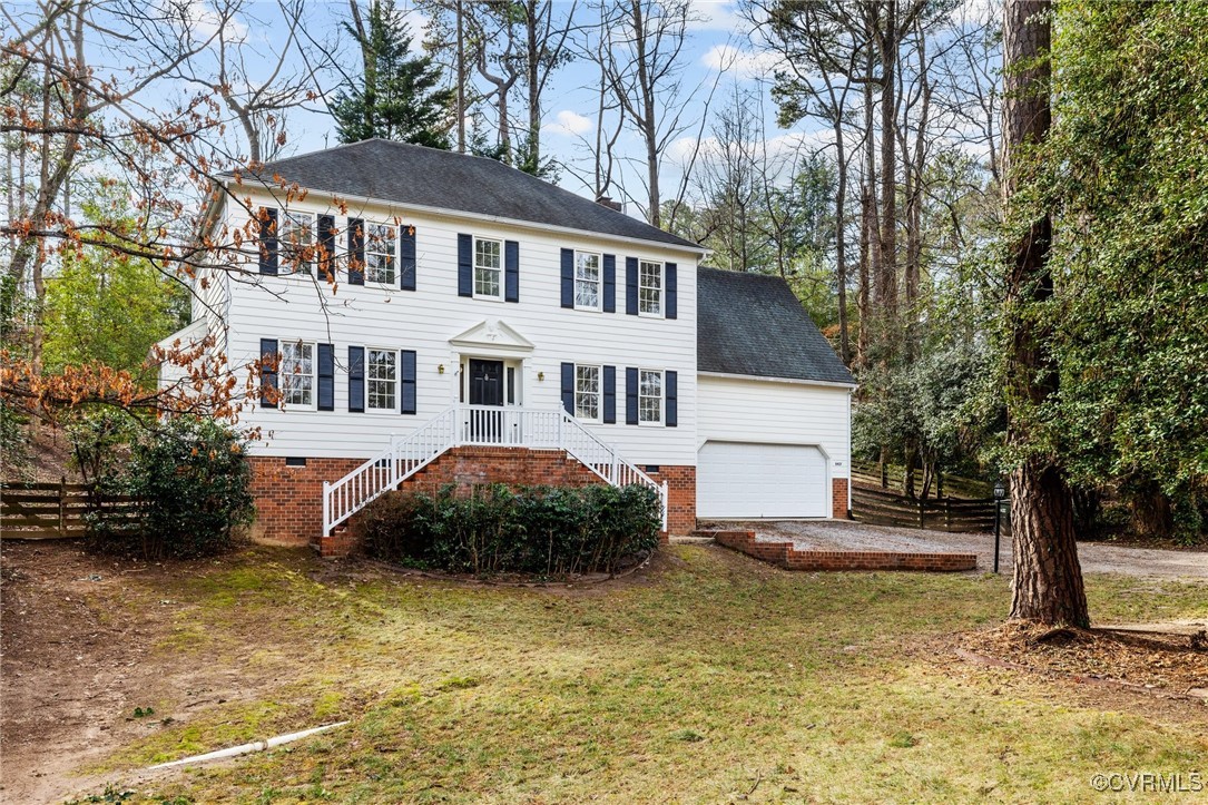 8437 Rubimont Road Richmond, VA 23235 - Photo 1 of 1 Colonial-style house featuring a garage and a fron