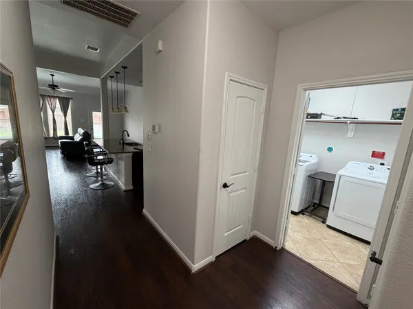 a utility room with dryer and washer