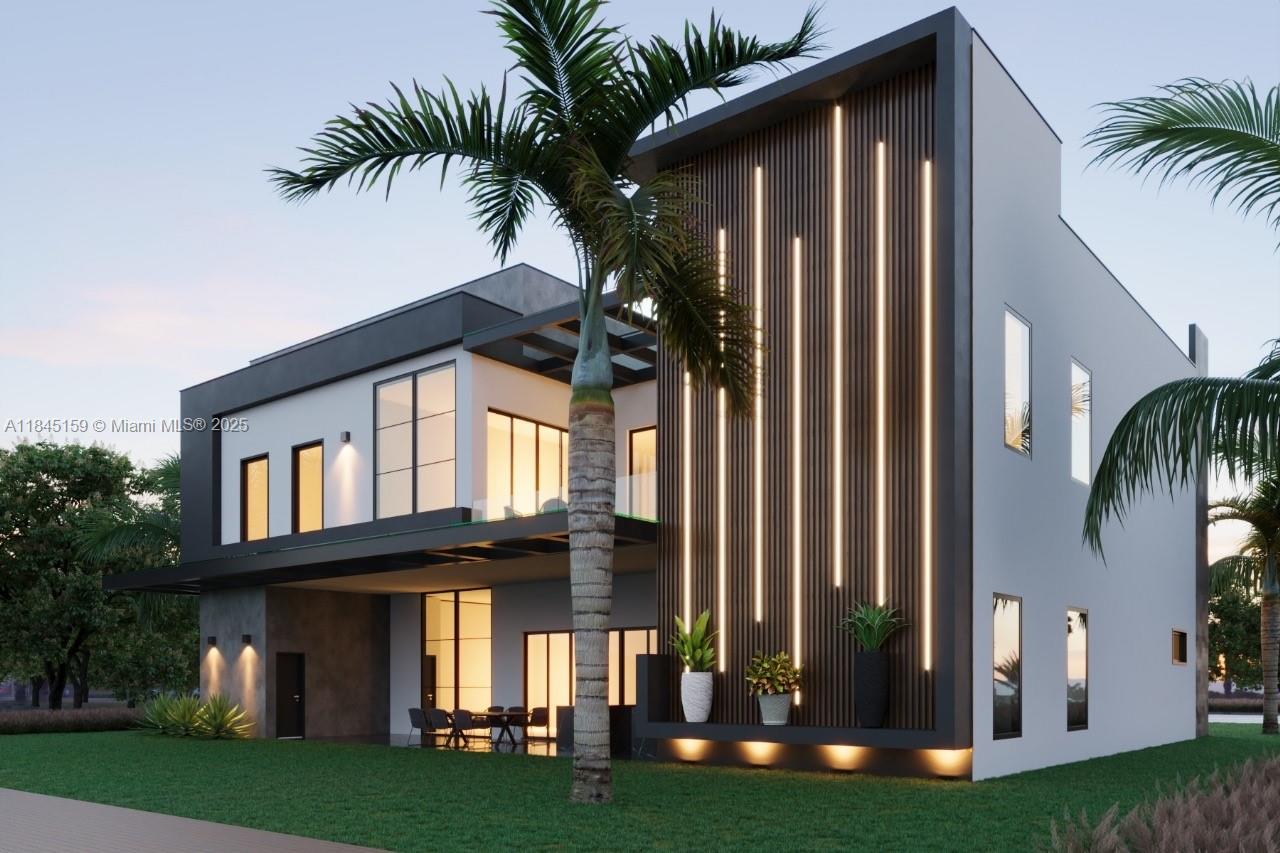 3751 Northeast 26th Avenue Lighthouse Point, FL 33064 - Photo 2 of 3 a front view of house with yard