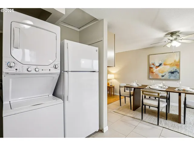 a view of kitchen with furniture and wooden floor