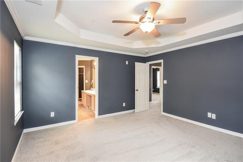 2716 River Tree Drive Decatur, GA 30034 - Photo 14 of 27 a view of an empty room with a ceiling fan