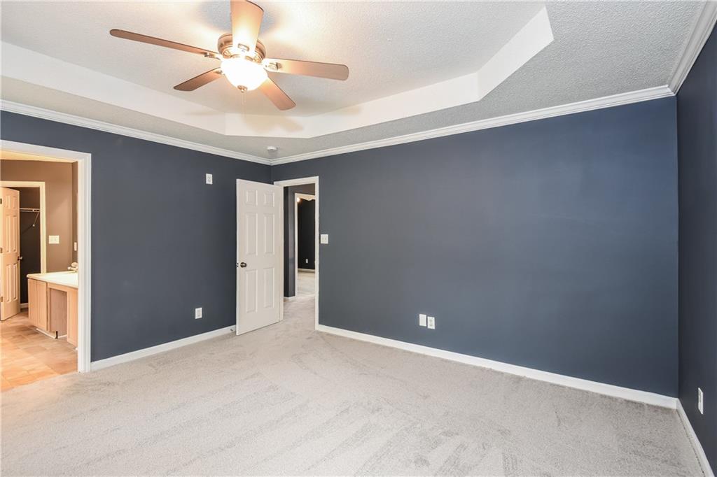 2716 River Tree Drive Decatur, GA 30034 - Photo 15 of 27 a view of an empty room with a ceiling fan