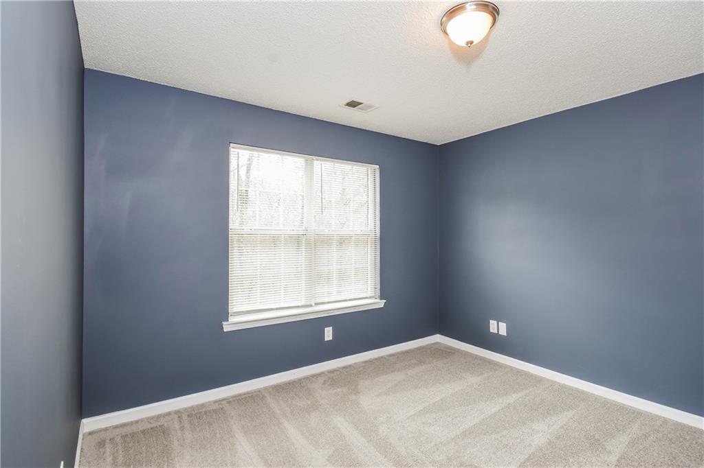 2716 River Tree Drive Decatur, GA 30034 - Photo 19 of 27 an empty room with windows