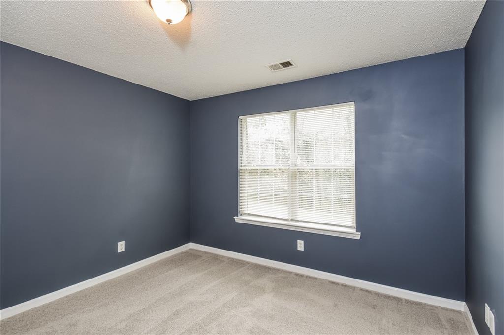 2716 River Tree Drive Decatur, GA 30034 - Photo 20 of 27 a view of an empty room with a window
