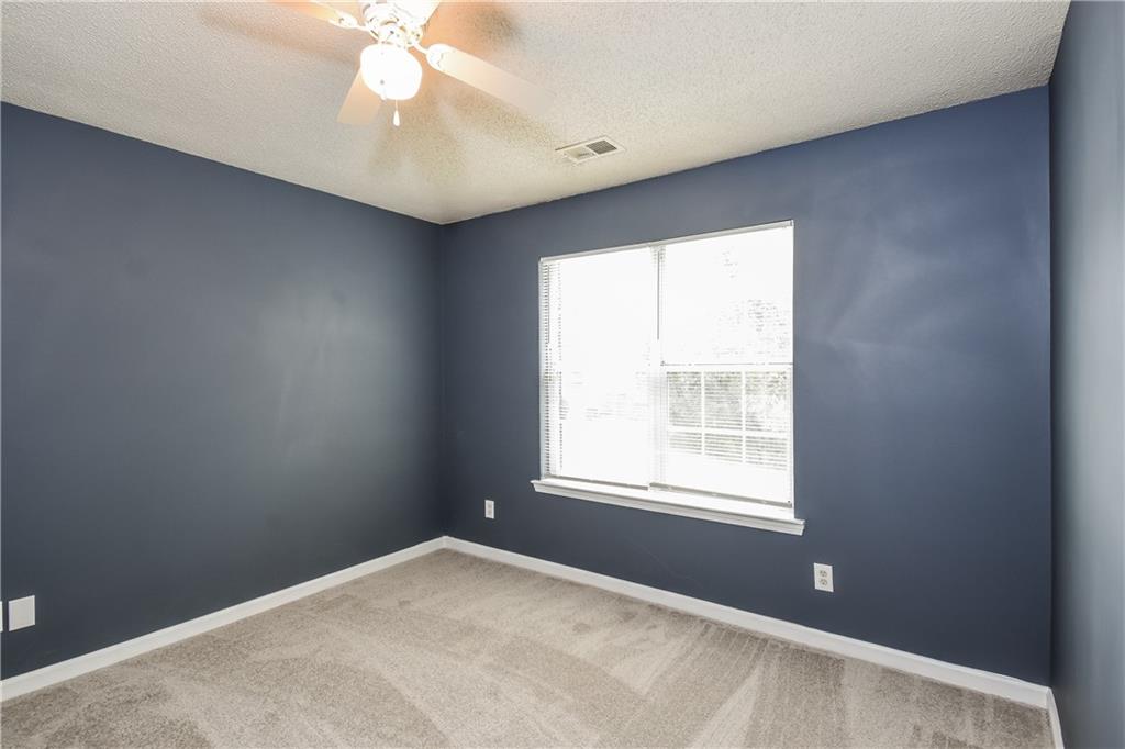 2716 River Tree Drive Decatur, GA 30034 - Photo 21 of 27 a view of an empty room with a window