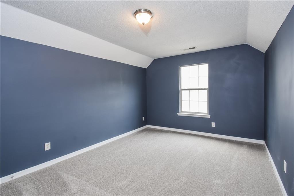 2716 River Tree Drive Decatur, GA 30034 - Photo 23 of 27 an empty room with a window