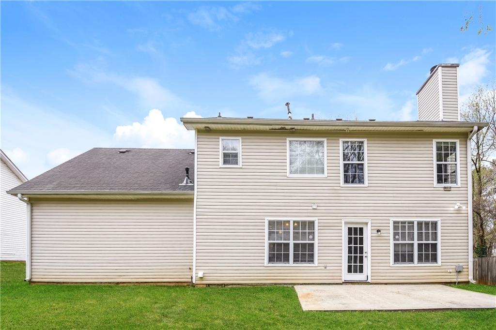 2716 River Tree Drive Decatur, GA 30034 - Photo 26 of 27 a view of a house with a yard