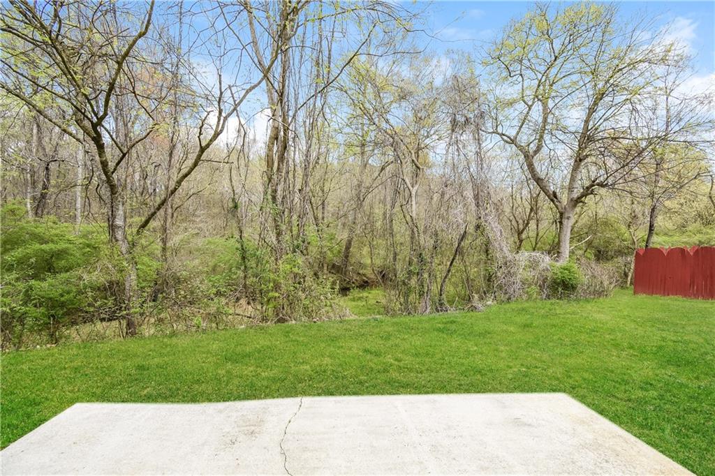 2716 River Tree Drive Decatur, GA 30034 - Photo 27 of 27 a backyard of a house with lots of green space