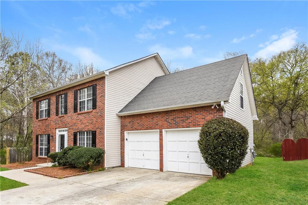 2716 River Tree Drive Decatur, GA 30034 - Photo 4 of 27 a view of a house with a garage