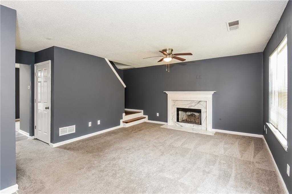 2716 River Tree Drive Decatur, GA 30034 - Photo 8 of 27 a view of a livingroom with a fireplace and window