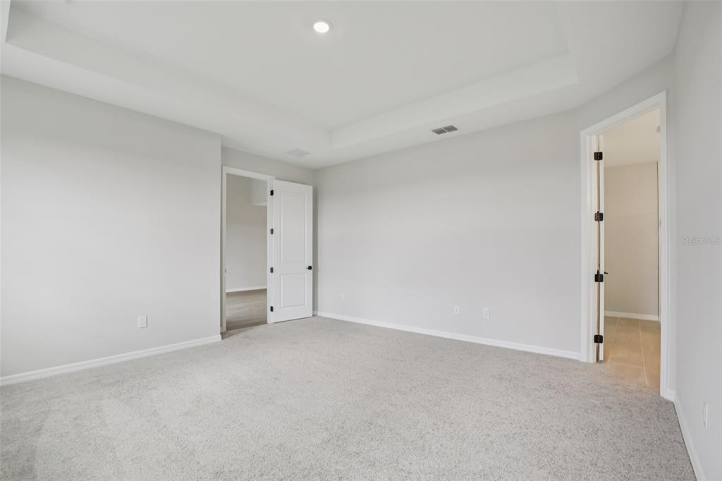 10167 Hidden Hammock Loop Parrish, FL 34221 - Photo 23 of 42 a view of an empty room