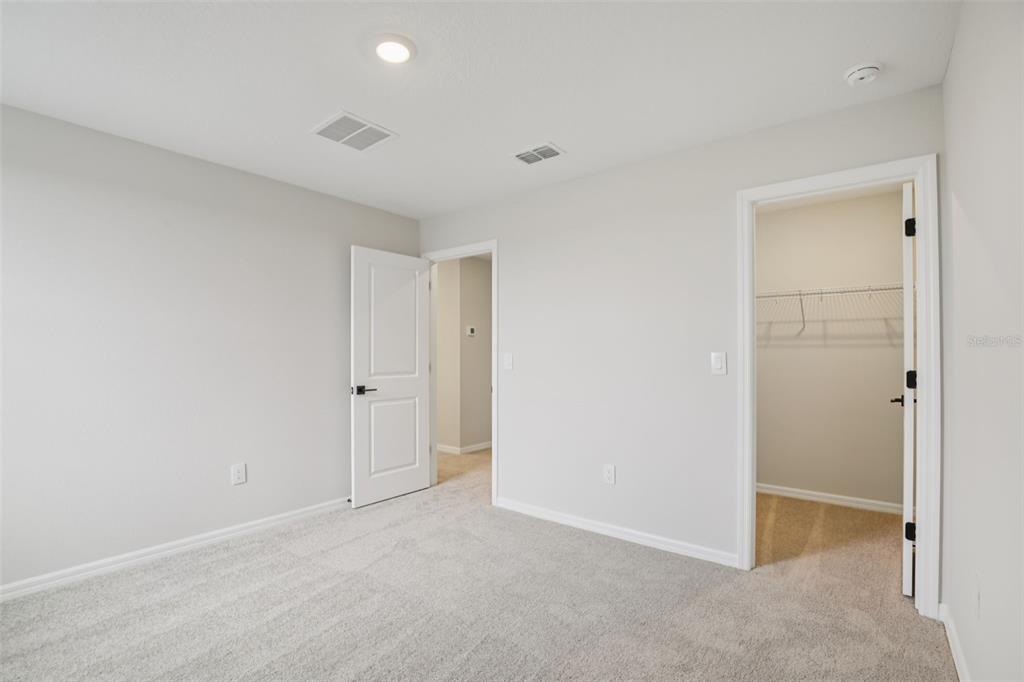 10167 Hidden Hammock Loop Parrish, FL 34221 - Photo 30 of 42 a view of an empty room