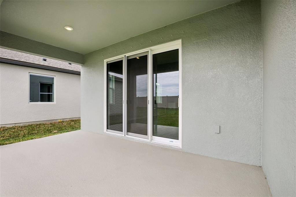 10167 Hidden Hammock Loop Parrish, FL 34221 - Photo 42 of 42 a view of an empty room with a window