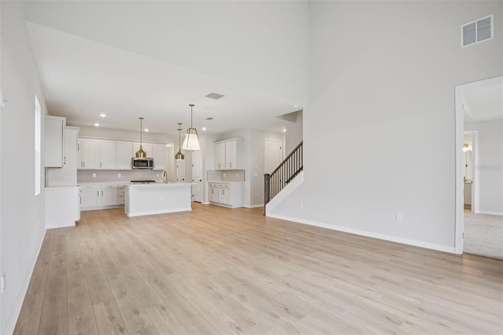 10167 Hidden Hammock Loop Parrish, FL 34221 - Photo 10 of 42 a view of kitchen with wooden floor