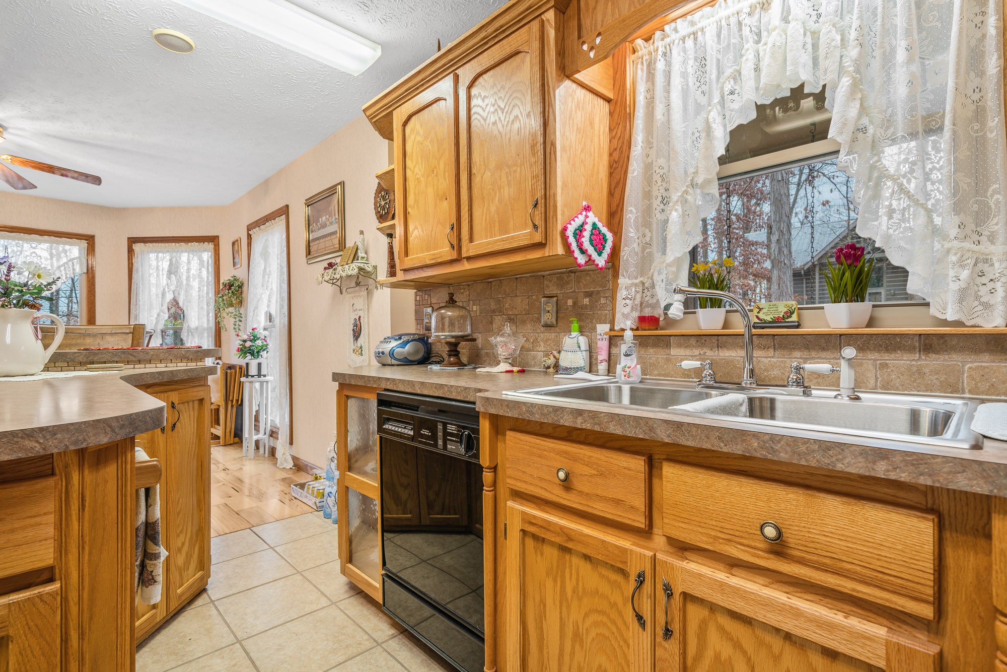 645 Rocky Top Road Sparta, TN 38583 - Photo 12 of 29 a kitchen with stainless steel appliances granite countertop a sink and a stove