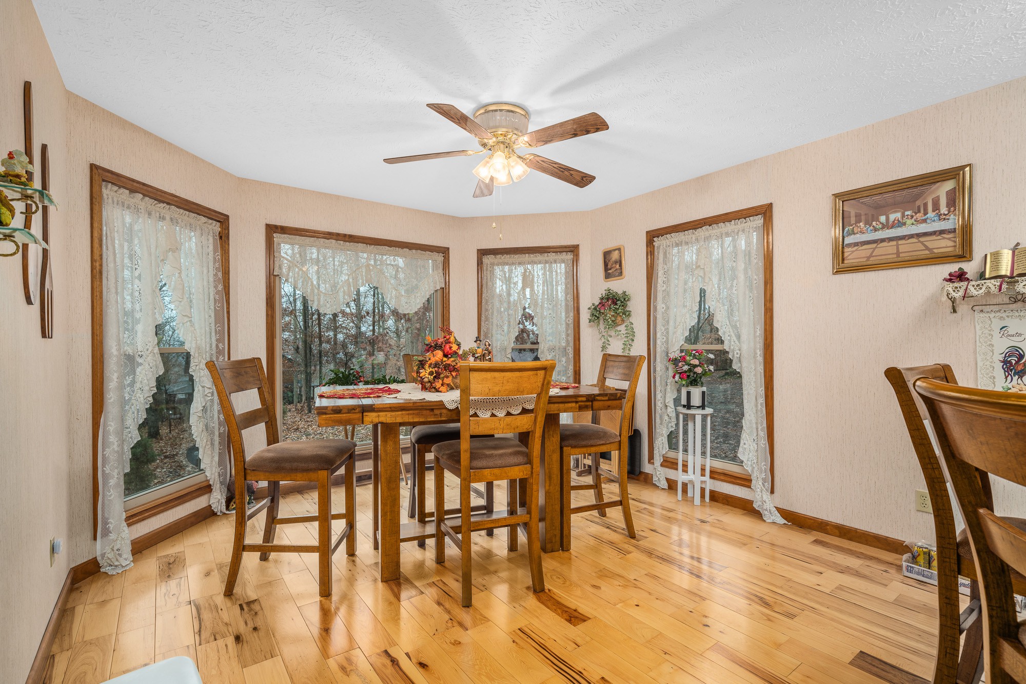 645 Rocky Top Road Sparta, TN 38583 - Photo 16 of 29 a view of a dining room with furniture window and wooden floor