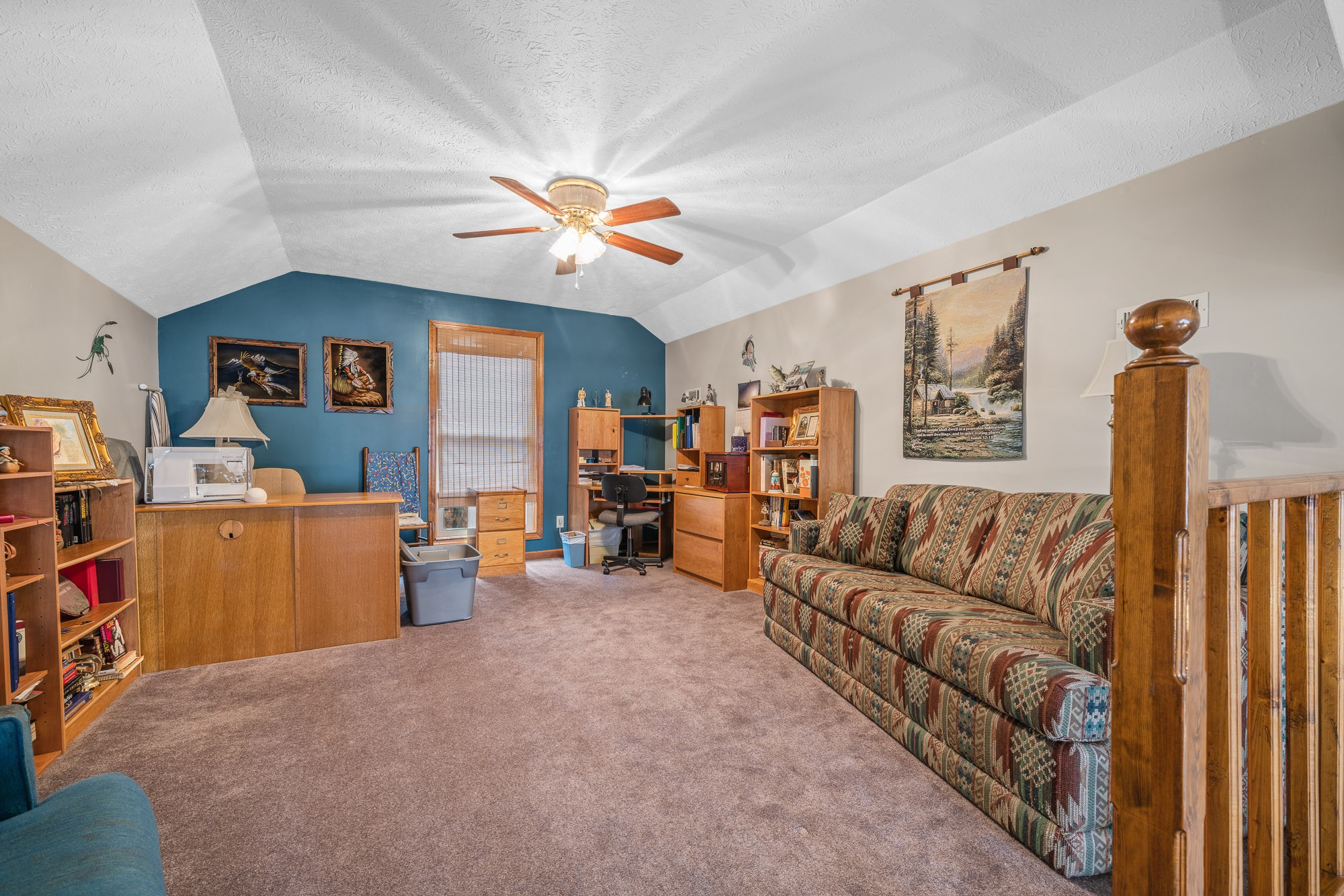 645 Rocky Top Road Sparta, TN 38583 - Photo 19 of 29 a living room with furniture and a chandelier