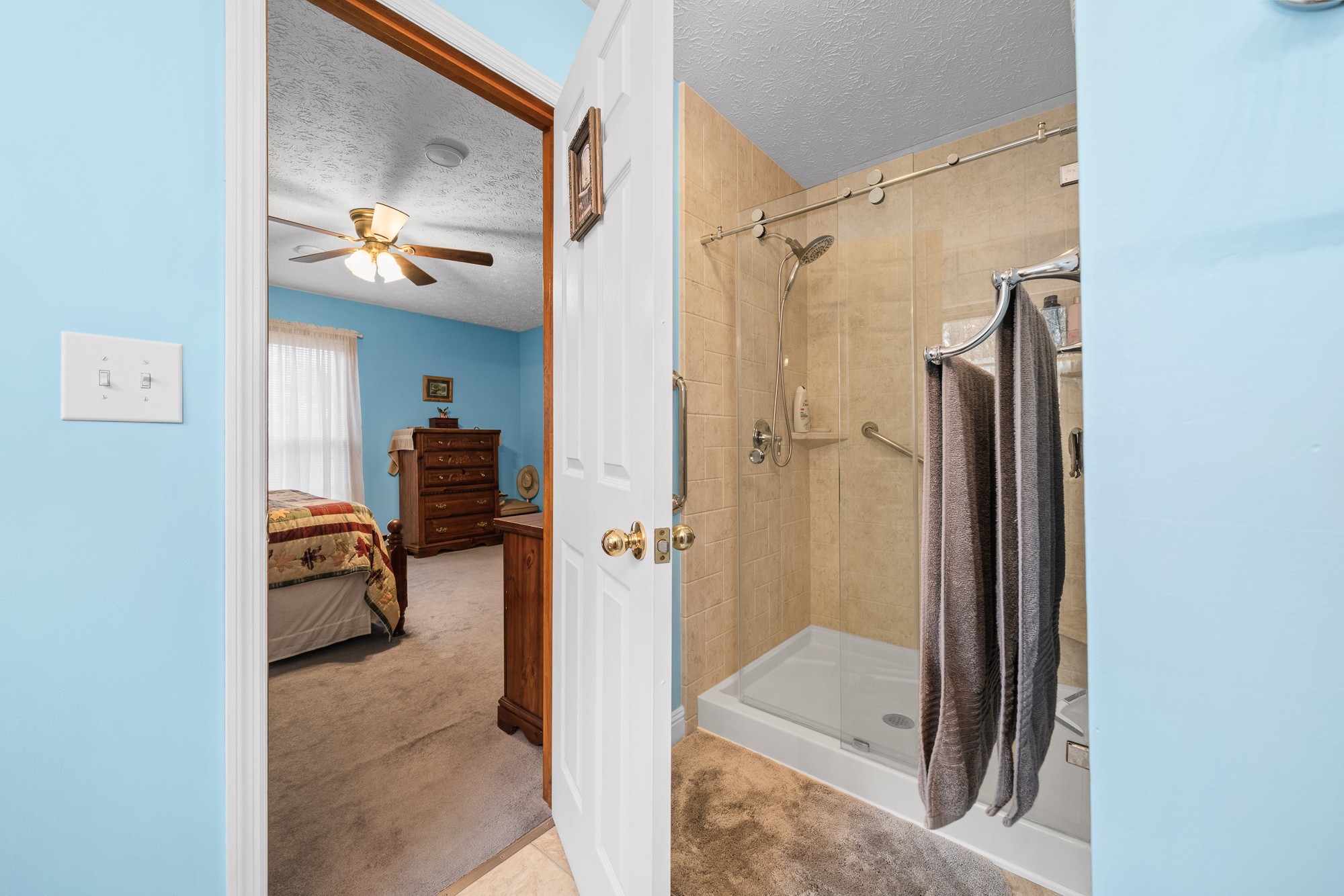 645 Rocky Top Road Sparta, TN 38583 - Photo 24 of 29 a view of a hallway to a livingroom and a livingroom with furniture