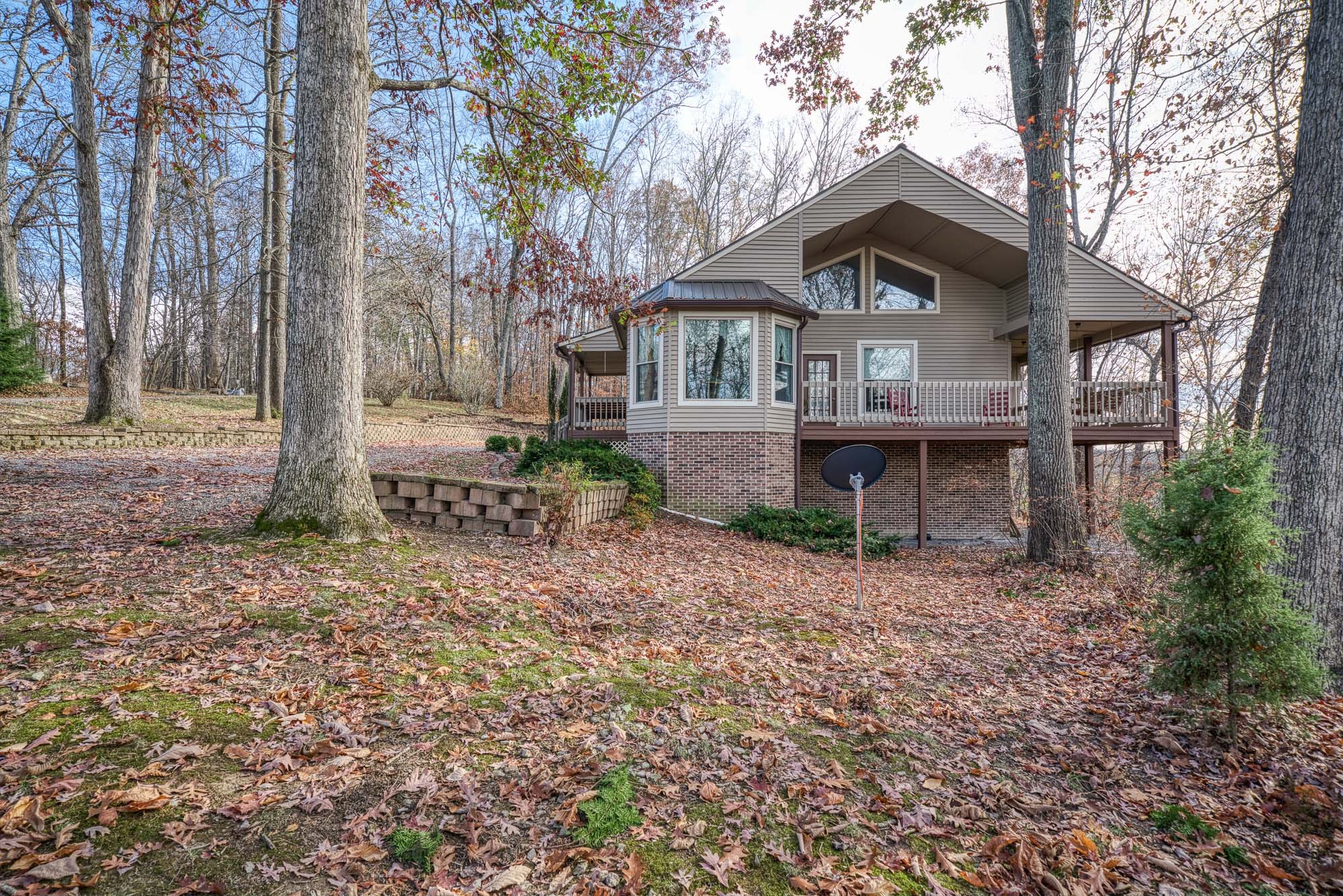 645 Rocky Top Road Sparta, TN 38583 - Photo 4 of 29 a front view of a house with garden