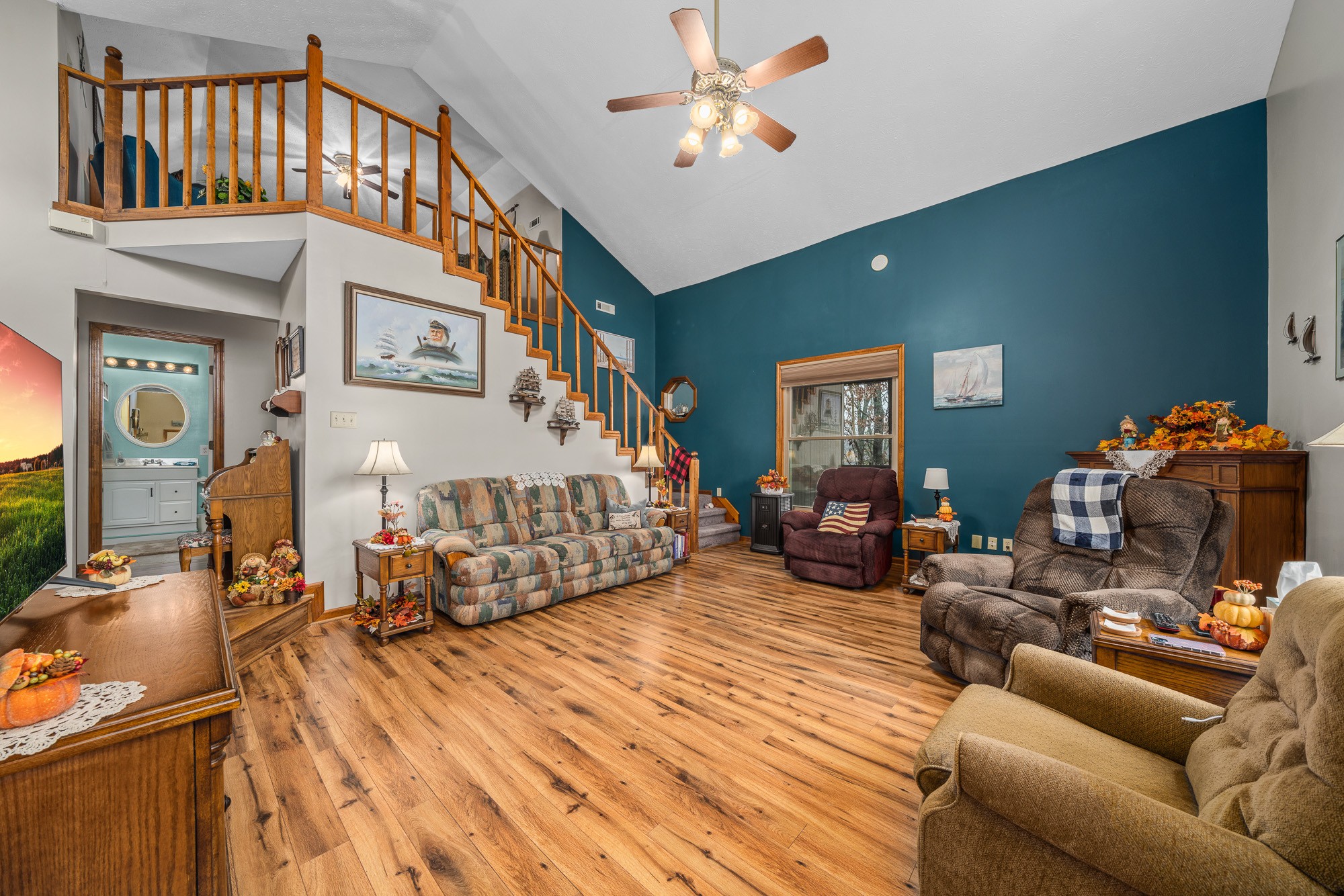 645 Rocky Top Road Sparta, TN 38583 - Photo 10 of 29 a bed room with furniture and a chandelier