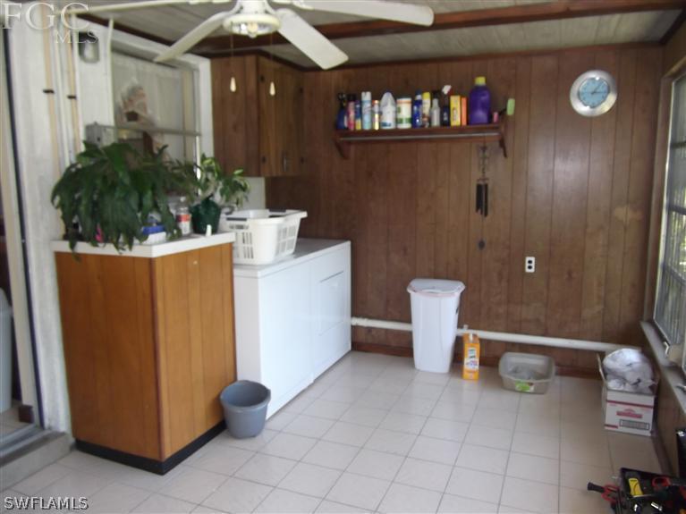 7310 Coon Road North Fort Myers, FL 33917 - Photo 5 of 10 a bathroom with a toilet and a shower