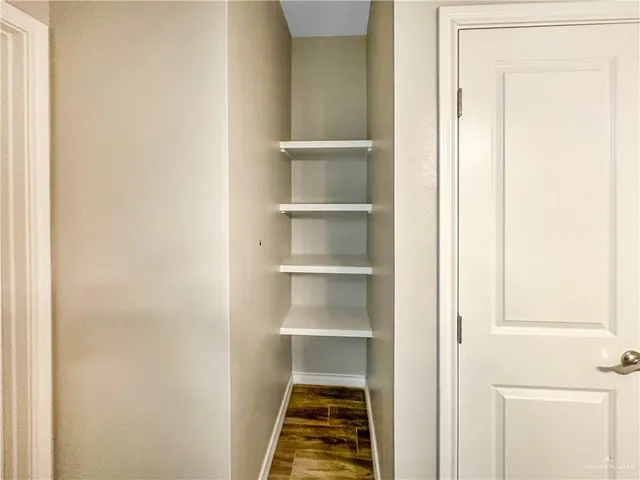 a room with storage and utility