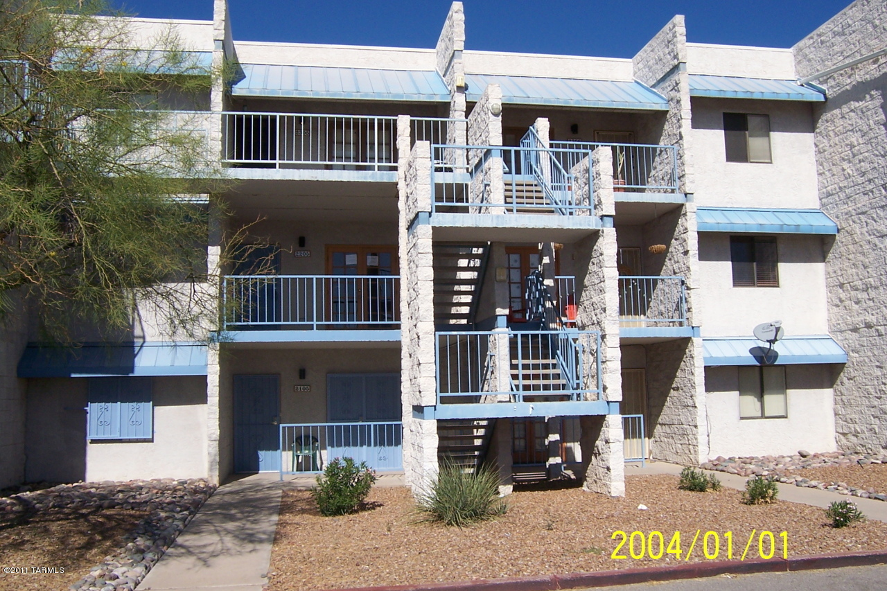 7777 East Golf Links Road, Unit 2205 Tucson, AZ 85730 - Photo 22 of 22 a front view of a building with glass windows