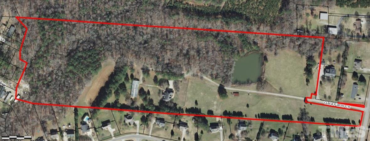 2140 Gala Farm Lane Raleigh, NC 27603 - Photo 2 of 20 a view of street with an trees and flowers