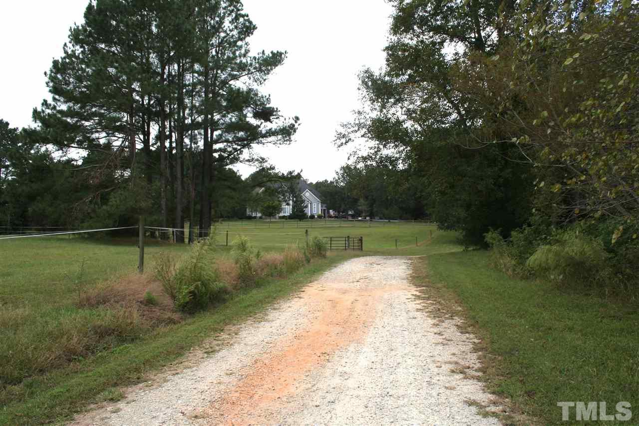 2140 Gala Farm Lane Raleigh, NC 27603 - Photo 13 of 20 a view of lake with a yard