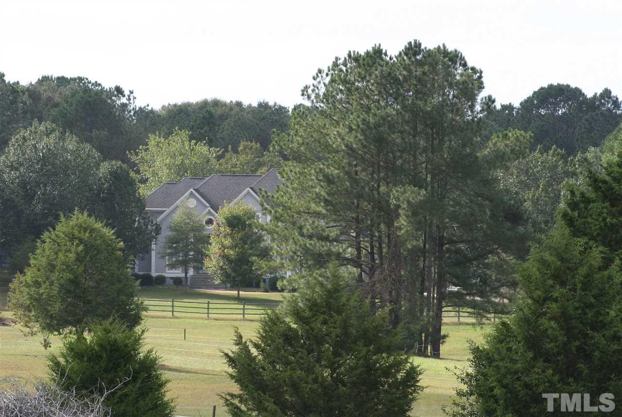 2140 Gala Farm Lane Raleigh, NC 27603 - Photo 7 of 20 a view of a lake view